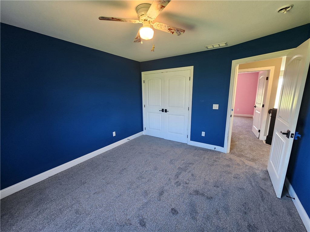 7441 Dodson Road Brookville, OH 45309 - Photo 34 of 50 This spacious bedroom offers ample comfort and privacy.