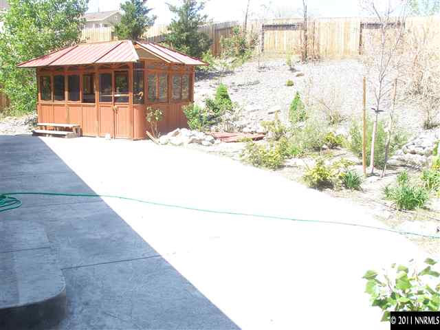 1794 Kodiak Circle Reno, NV 89511 - Photo 13 of 13 a front view of a house with a yard