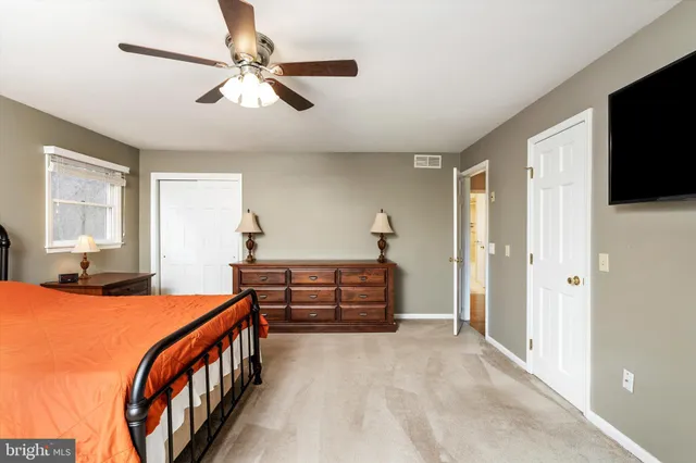 a view of a hall with wooden floor
