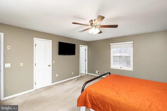 a dining room with wooden floor and breakfast area