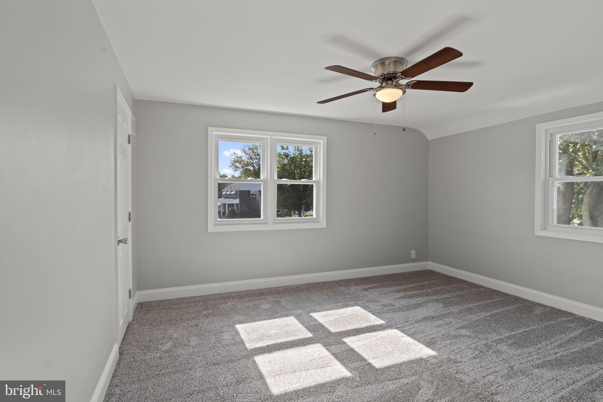 416 Adair Road Holmes, PA 19043 - Photo 12 of 32 a view of an empty room with a window