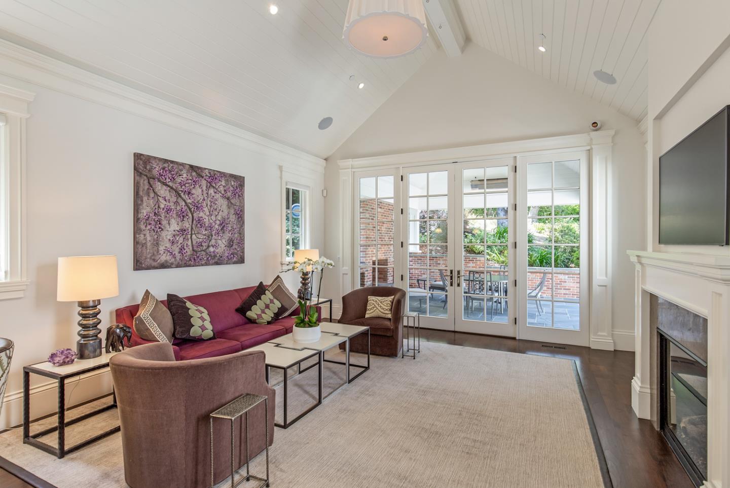 351 Walsh Road Atherton, CA 94027 - Photo 49 of 65 a living room with furniture and a fireplace