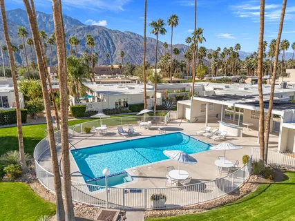 a view of a swimming pool with a patio