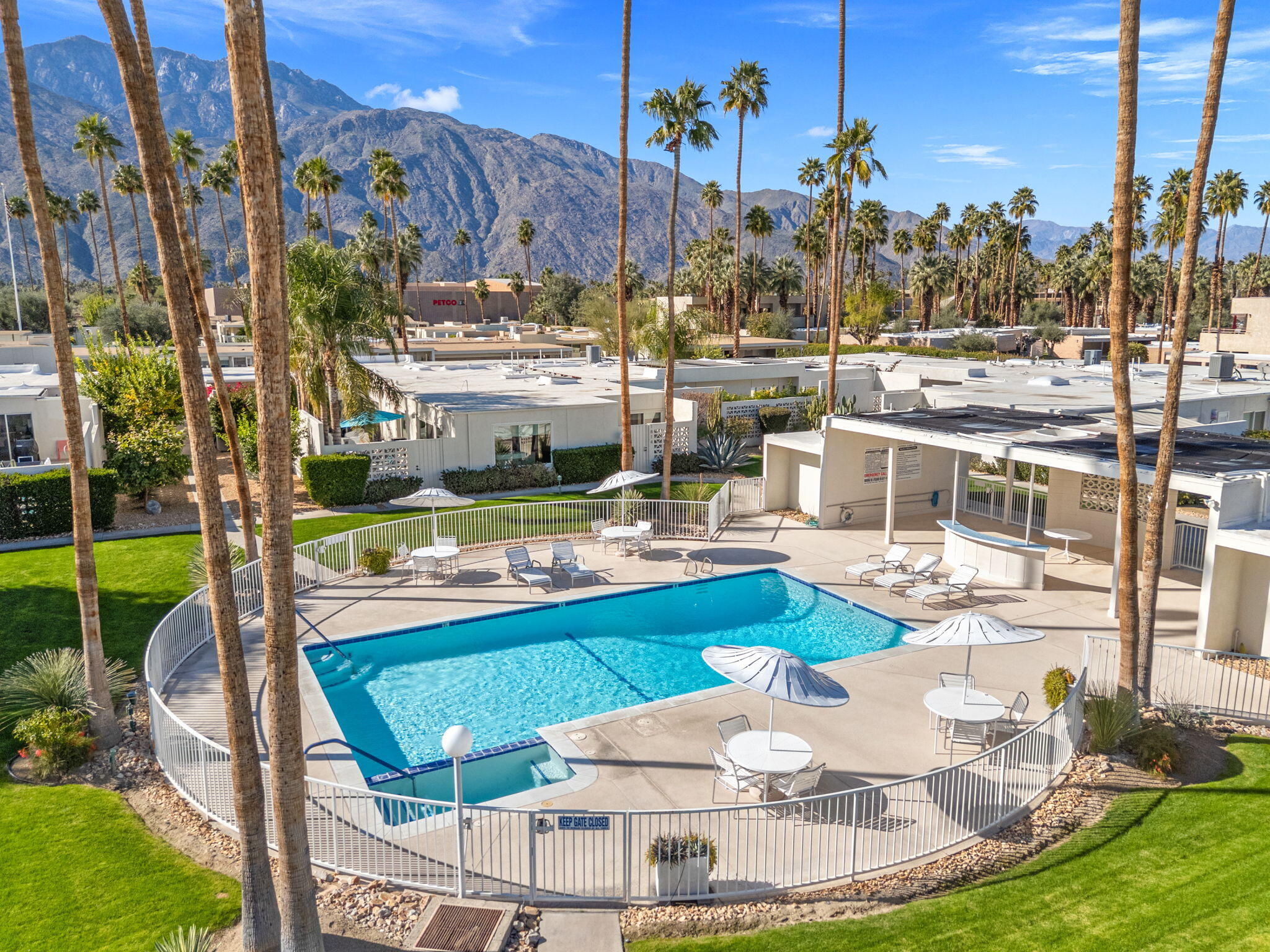 a view of a swimming pool with a patio