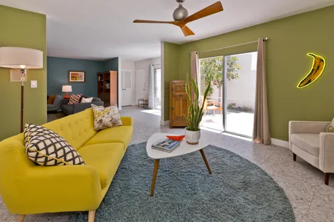 a view of an empty room with glass door