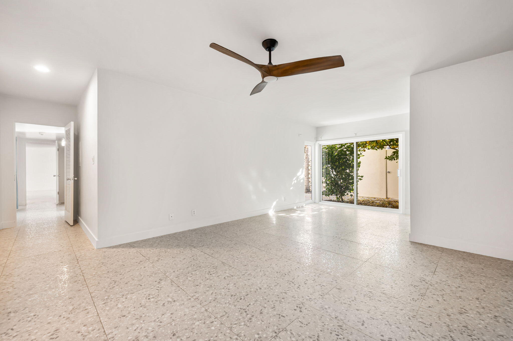 1810 Sandcliff Road Palm Springs, CA 92264 - Photo 23 of 55 an empty room with windows and closet