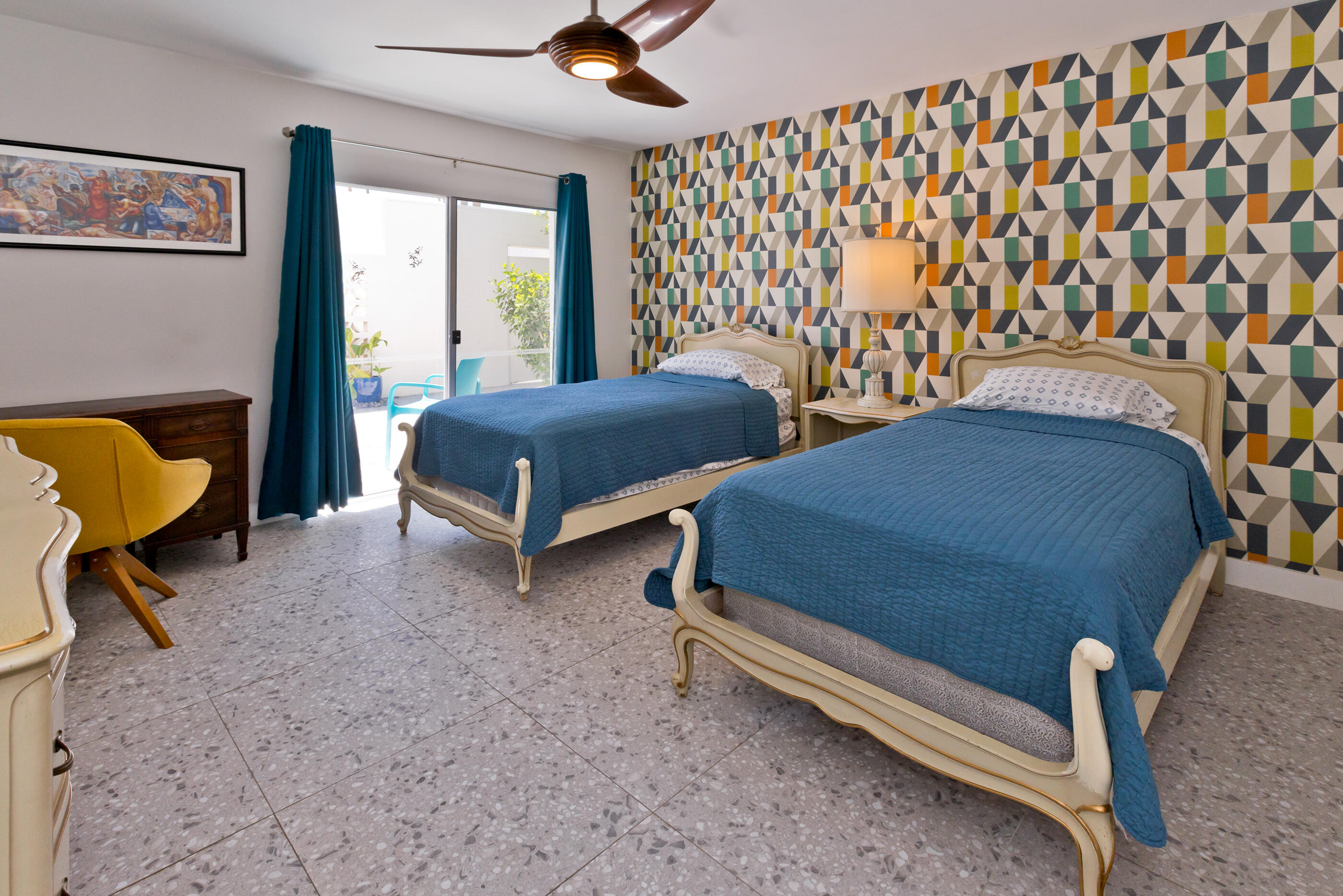 1810 Sandcliff Road Palm Springs, CA 92264 - Photo 33 of 55 a bedroom with two beds and a chandelier