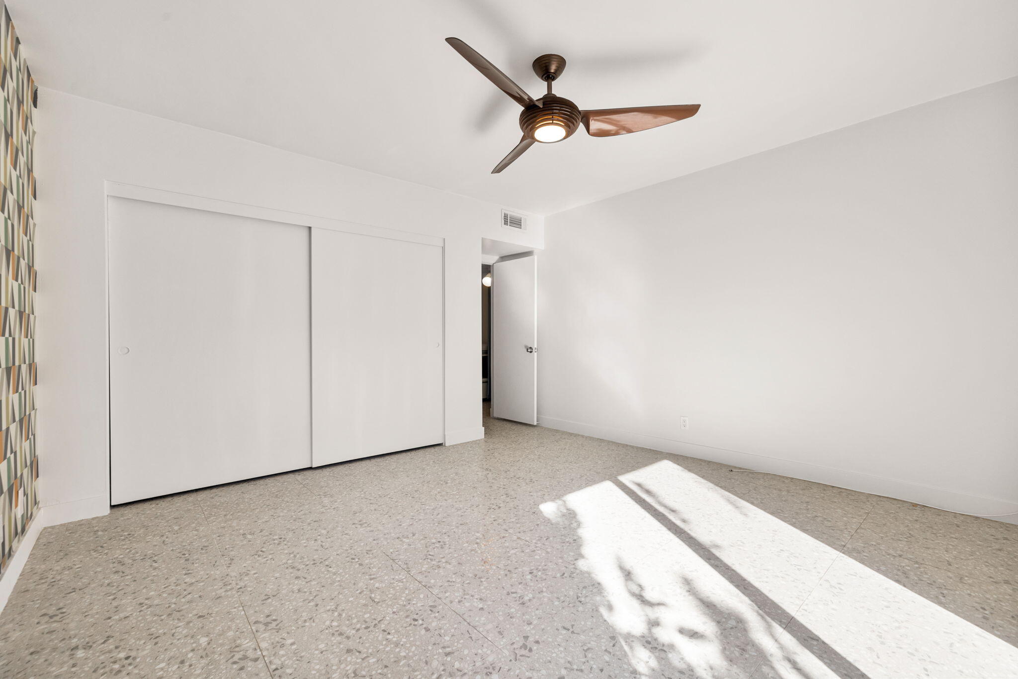 1810 Sandcliff Road Palm Springs, CA 92264 - Photo 34 of 55 an empty room with a ceiling fan and a window