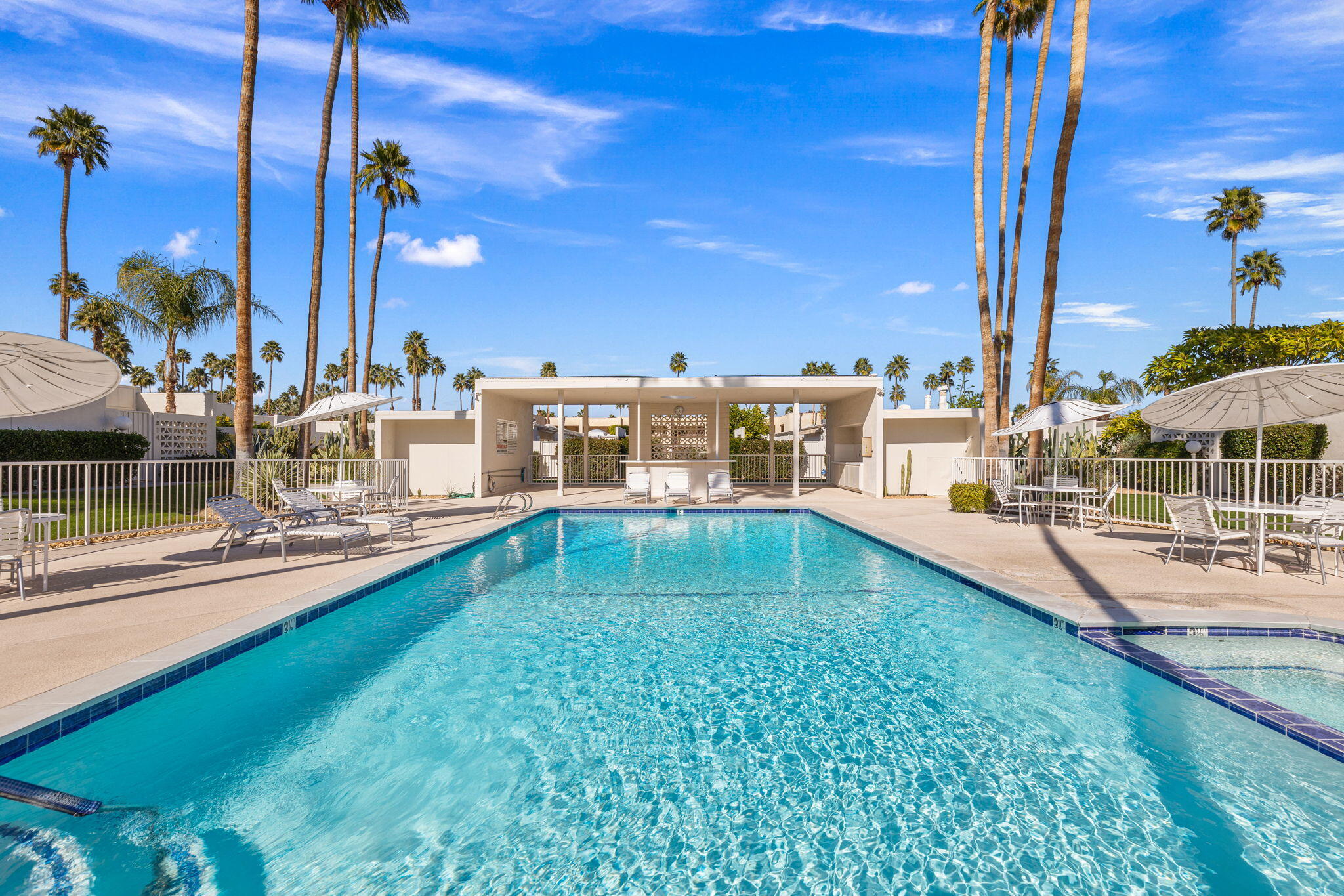 1810 Sandcliff Road Palm Springs, CA 92264 - Photo 45 of 55 a swimming pool with outdoor seating and yard