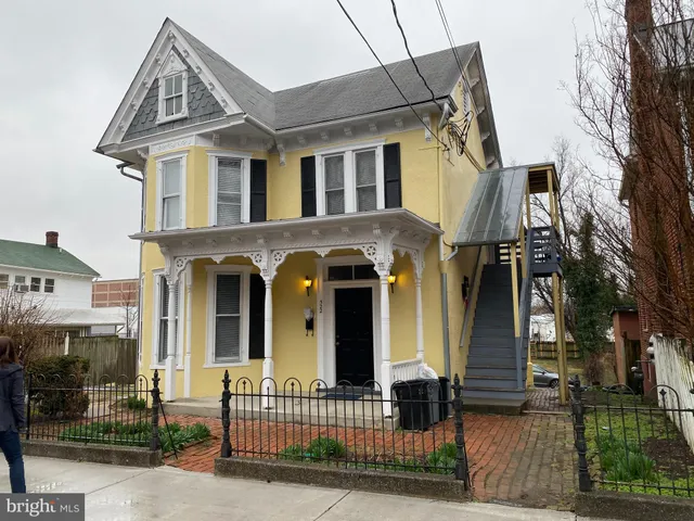 front view of a house with a small yard