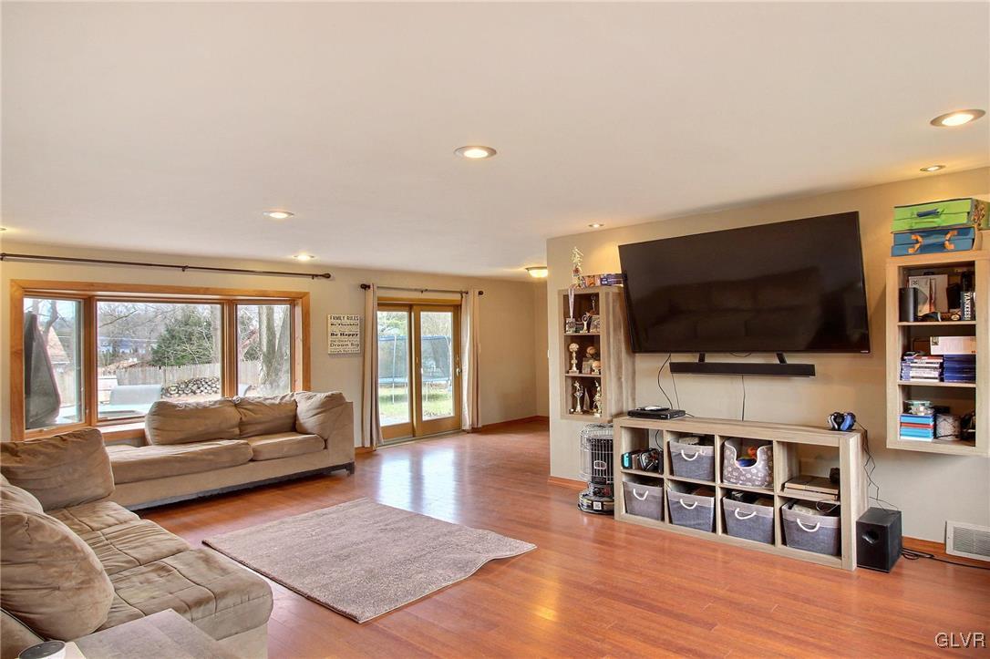 2000 Laural Street Stroudsburg, PA 18360 - Photo 5 of 14 a living room with furniture and a flat screen tv