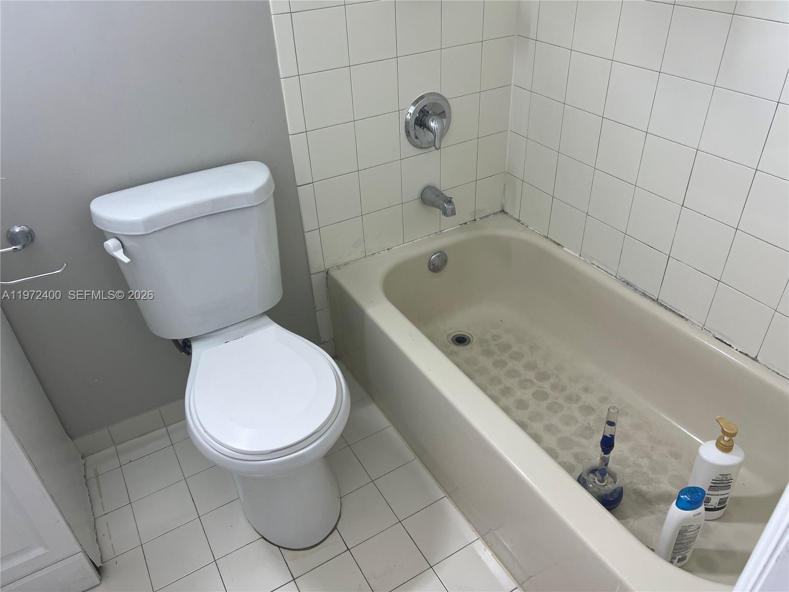 95 Southwest 15th Road Homestead, FL 33030 - Photo 29 of 42 a bathroom with a sink and a toilet