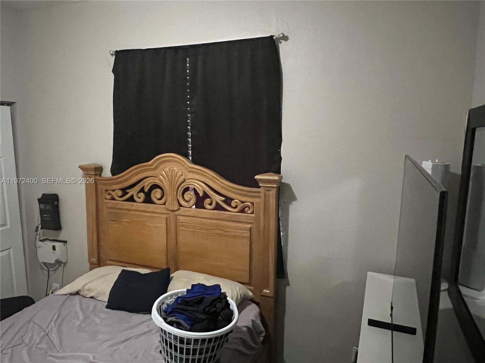 95 Southwest 15th Road Homestead, FL 33030 - Photo 31 of 42 a bathroom with a sink and toilet