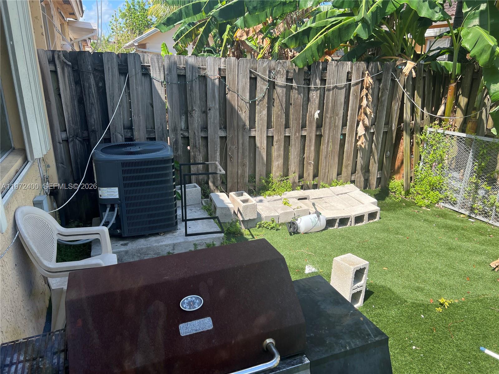 95 Southwest 15th Road Homestead, FL 33030 - Photo 33 of 42 a view of outdoor space with seating area