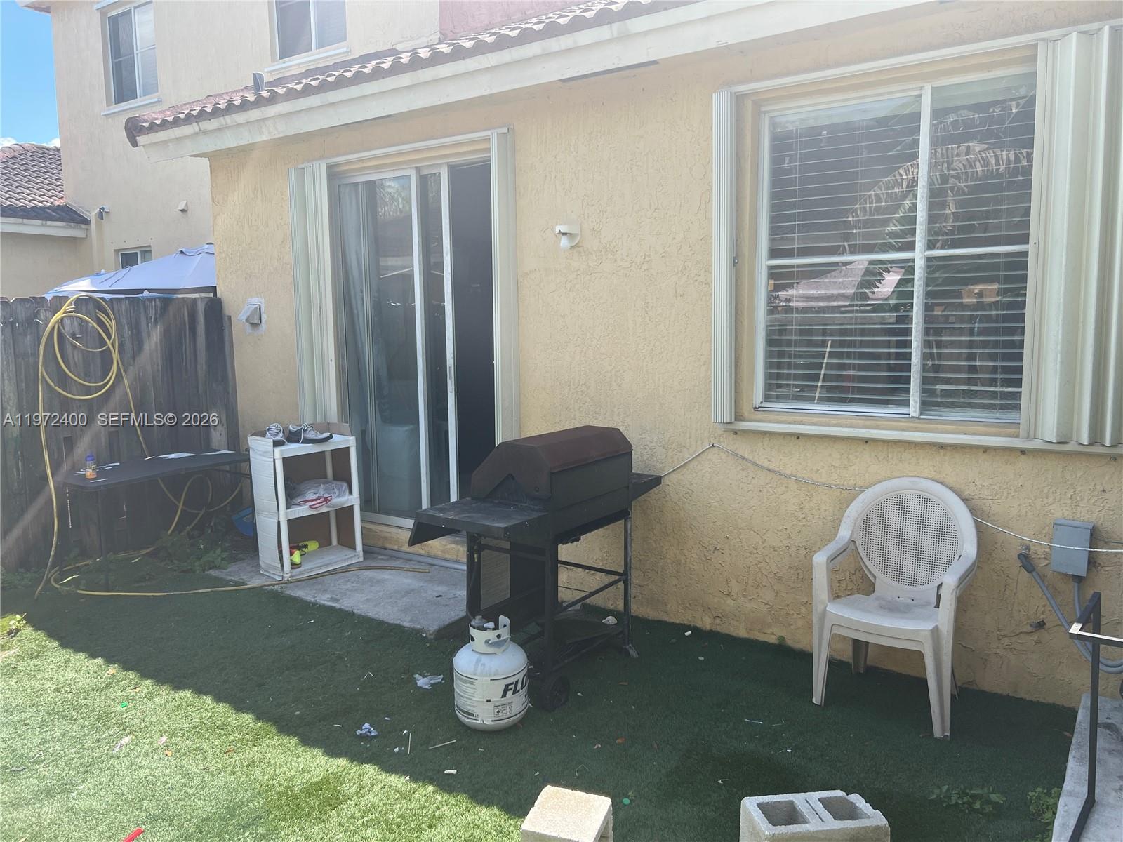 95 Southwest 15th Road Homestead, FL 33030 - Photo 37 of 42 a view of livingroom and dining room with furniture