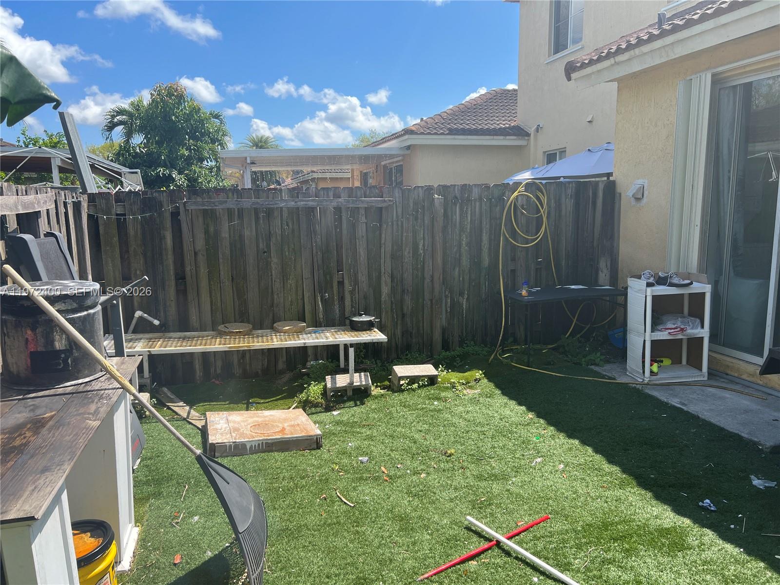 95 Southwest 15th Road Homestead, FL 33030 - Photo 38 of 42 a view of outdoor space and yard