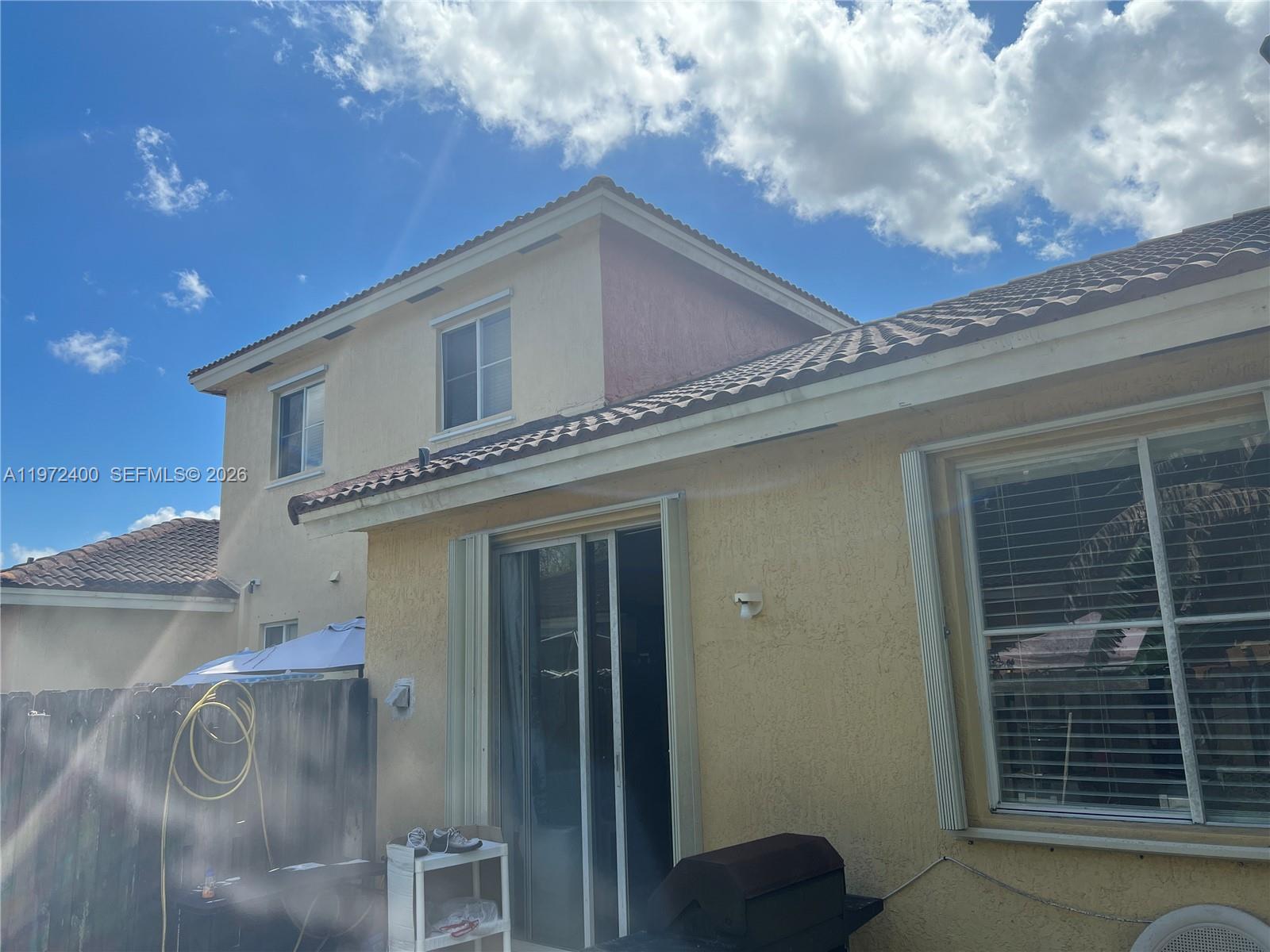 95 Southwest 15th Road Homestead, FL 33030 - Photo 39 of 42 a view of a house with a balcony
