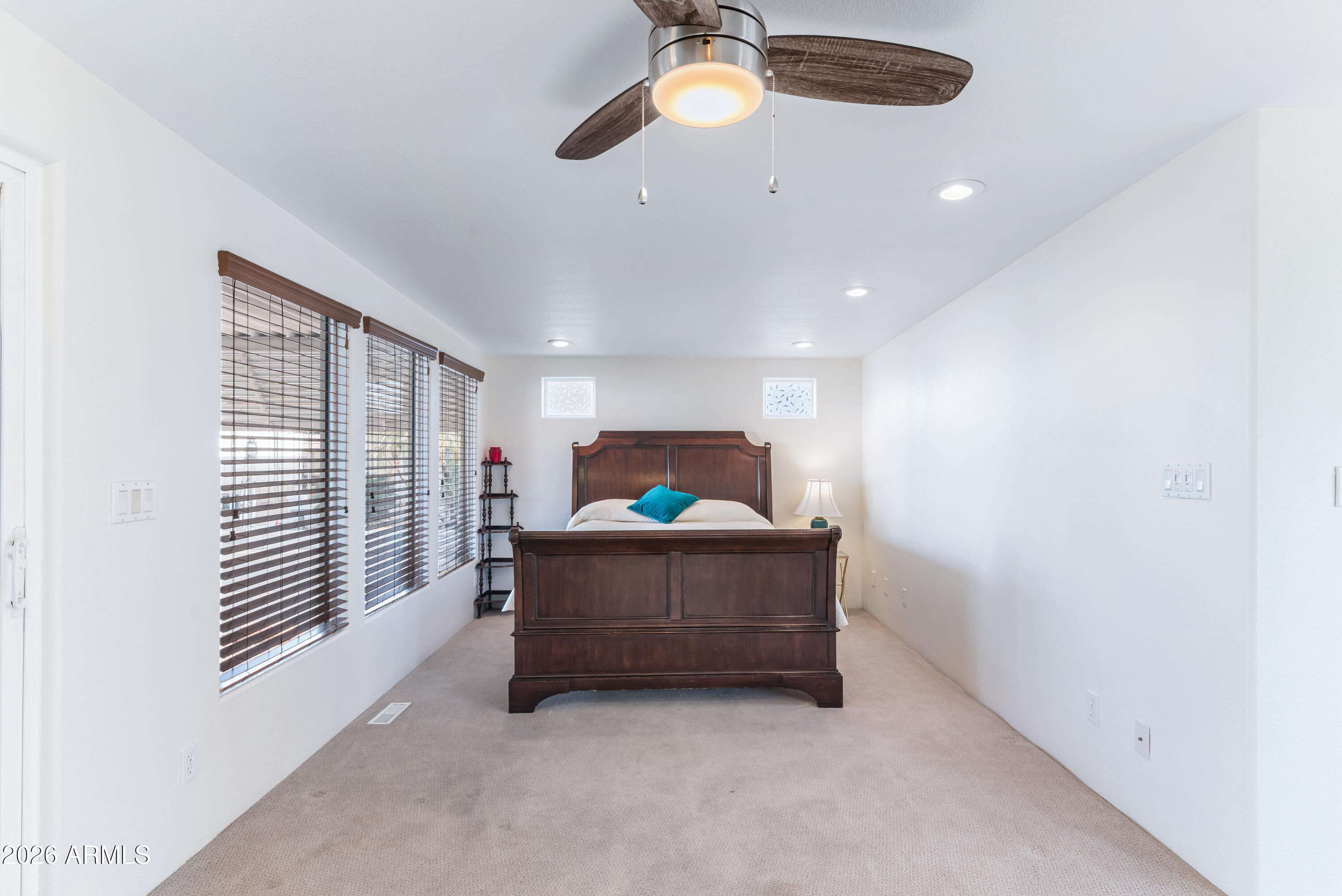 111 South Greenfield Road, Unit 547 Mesa, AZ 85206 - Photo 21 of 38 a living room with furniture and a window