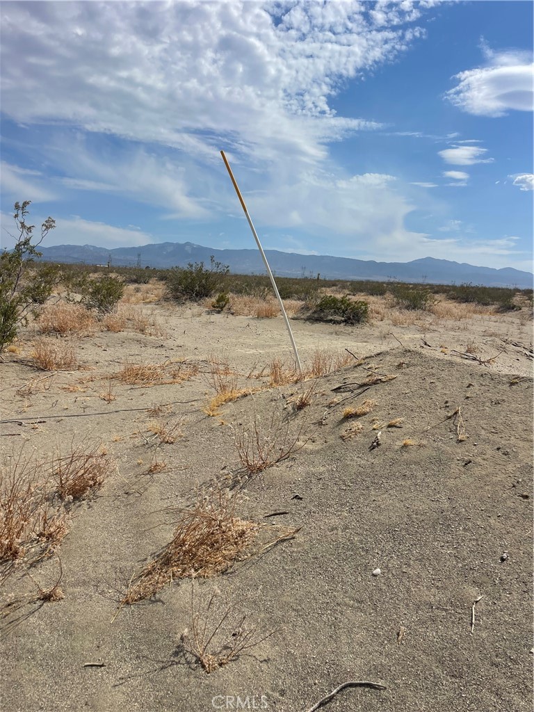 0 Rancho Road Phelan, CA 92371 - Photo 2 of 9 a view of a dry yard with wooden stairs