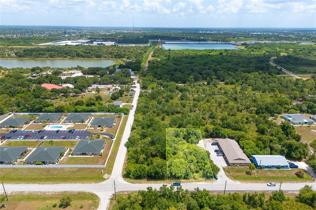 25018 Harbor View Road Punta Gorda, FL 33980 - Photo 10 of 12 an aerial view of residential houses with outdoor space and swimming pool