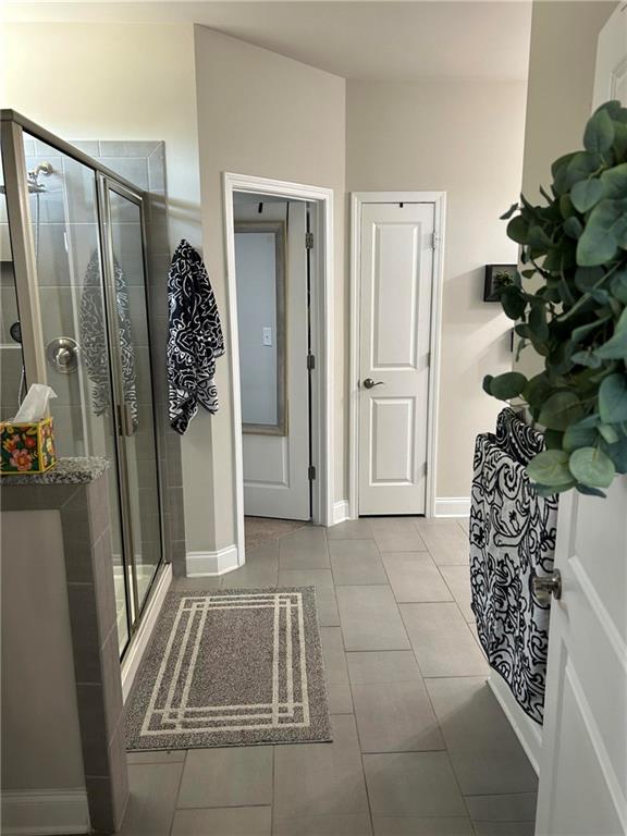 5860 Stargazer Way Cumming, GA 30028 - Photo 17 of 36 a view of entryway with window and front door