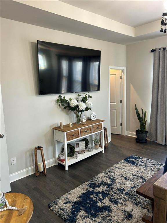 5860 Stargazer Way Cumming, GA 30028 - Photo 22 of 36 a living room with a flat screen tv