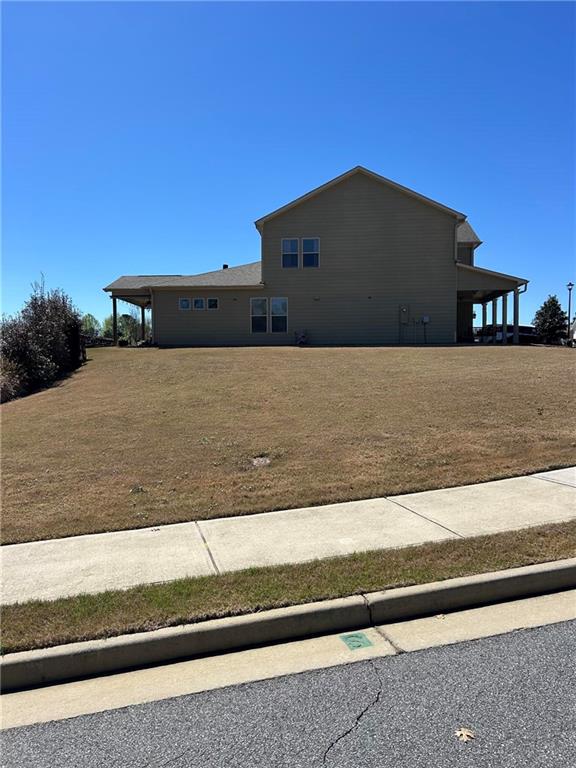 5860 Stargazer Way Cumming, GA 30028 - Photo 3 of 36 a view of a big building