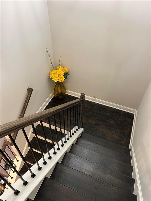 5860 Stargazer Way Cumming, GA 30028 - Photo 33 of 36 a view of entryway with wooden floor