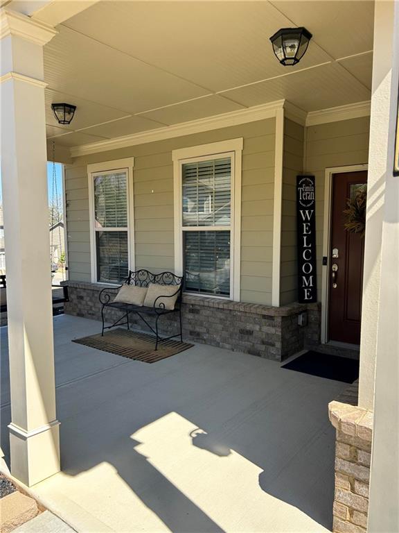 5860 Stargazer Way Cumming, GA 30028 - Photo 34 of 36 a living room with furniture
