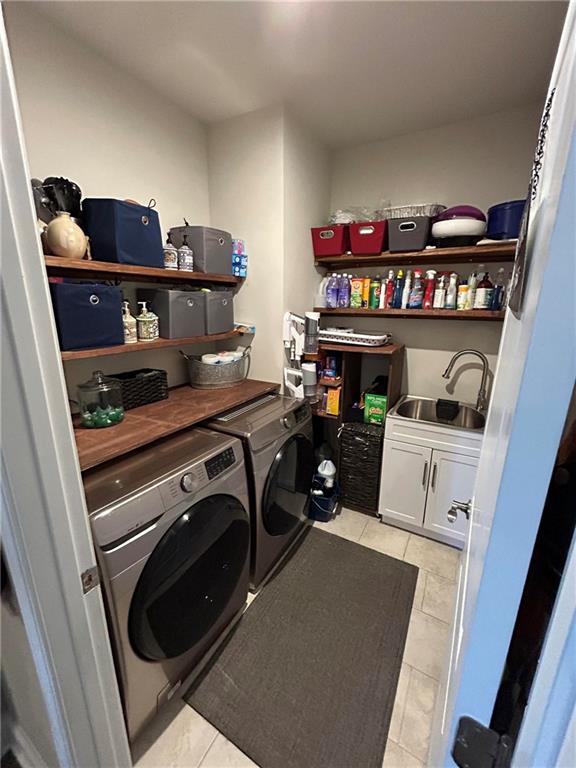 5860 Stargazer Way Cumming, GA 30028 - Photo 4 of 36 a view of washer and dryer
