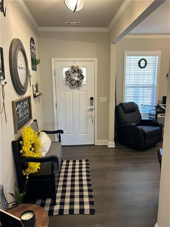 5860 Stargazer Way Cumming, GA 30028 - Photo 7 of 36 a living room with furniture and a wooden floor