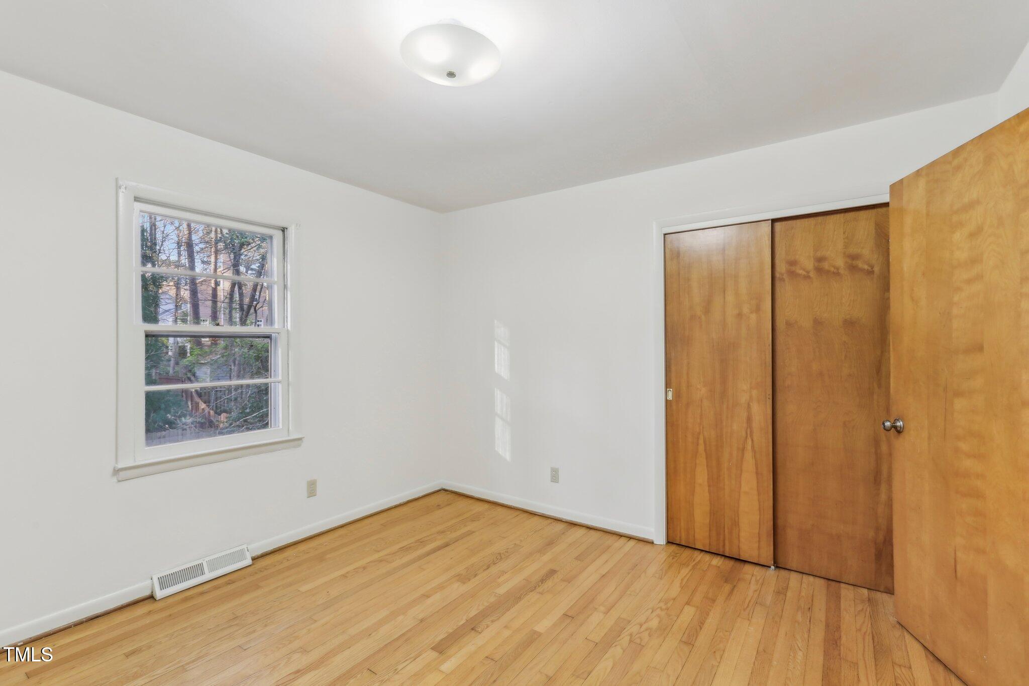 209 High House Road Cary, NC 27513 - Photo 17 of 40 an empty room with windows