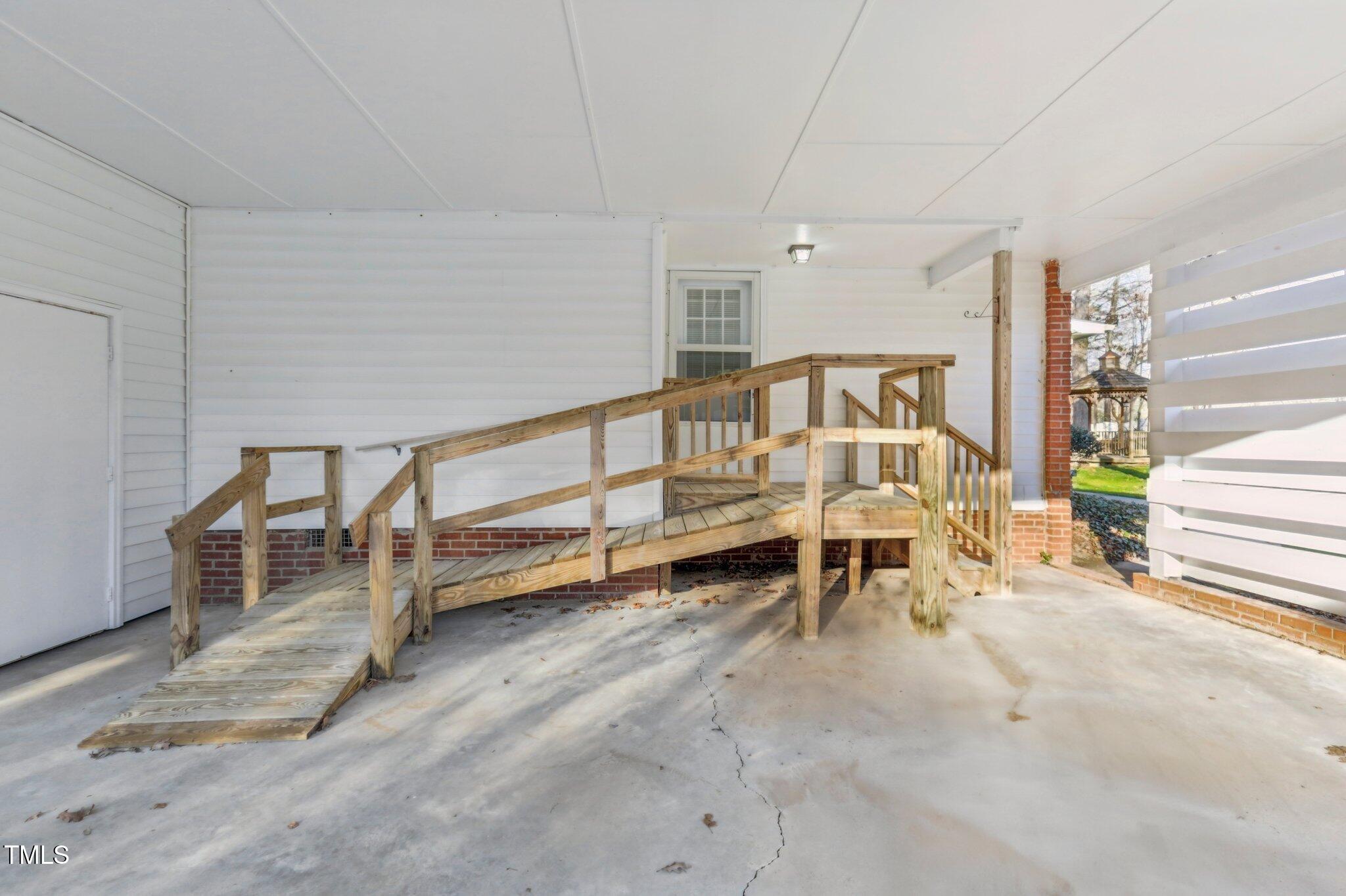 209 High House Road Cary, NC 27513 - Photo 29 of 40 a white bench sitting in a room
