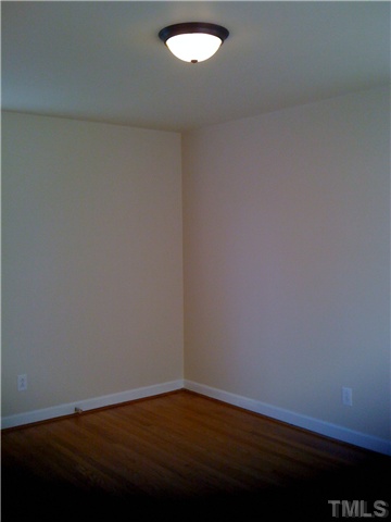 3501 Mercury Circle Raleigh, NC 27604 - Photo 11 of 11 Bedroom 3 also has hardwood floors and updated lighting.