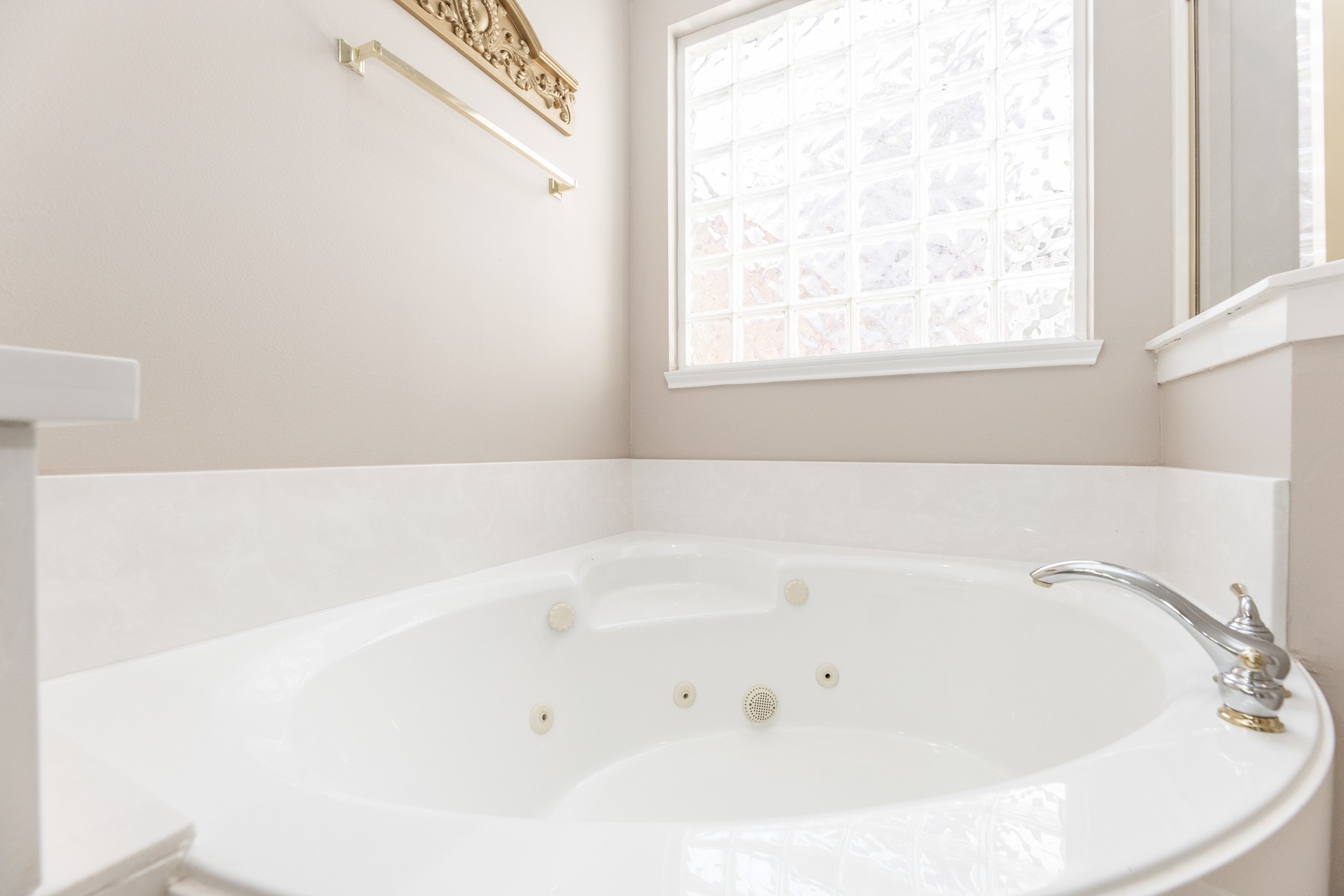 1222 Brinson Court Spring, TX 77379 - Photo 25 of 35 a white bath tub sitting in a bathroom