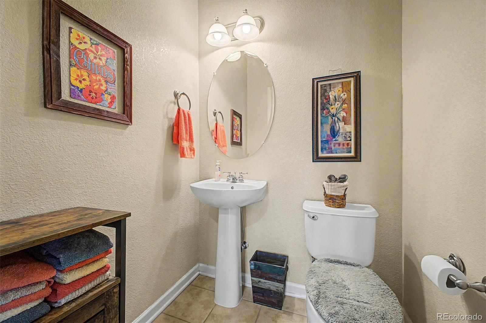3343 Fantasy Place Castle Rock, CO 80109 - Photo 12 of 50 a bathroom with a sink mirror and toilet