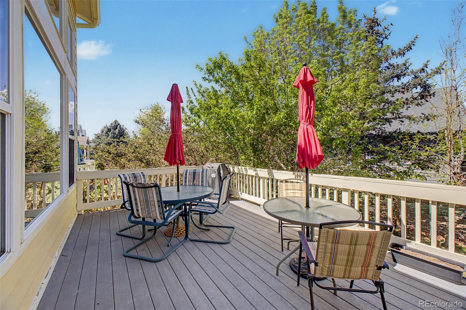 3343 Fantasy Place Castle Rock, CO 80109 - Photo 34 of 50 a view of a dining table and chairs on the roof deck