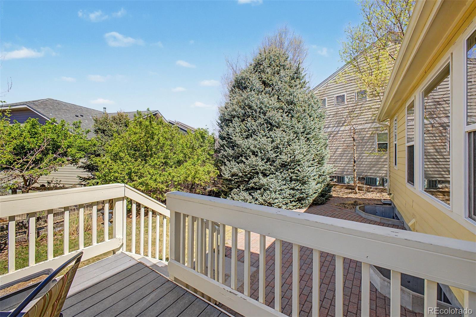 3343 Fantasy Place Castle Rock, CO 80109 - Photo 35 of 50 a view of a balcony with wooden fence and floor
