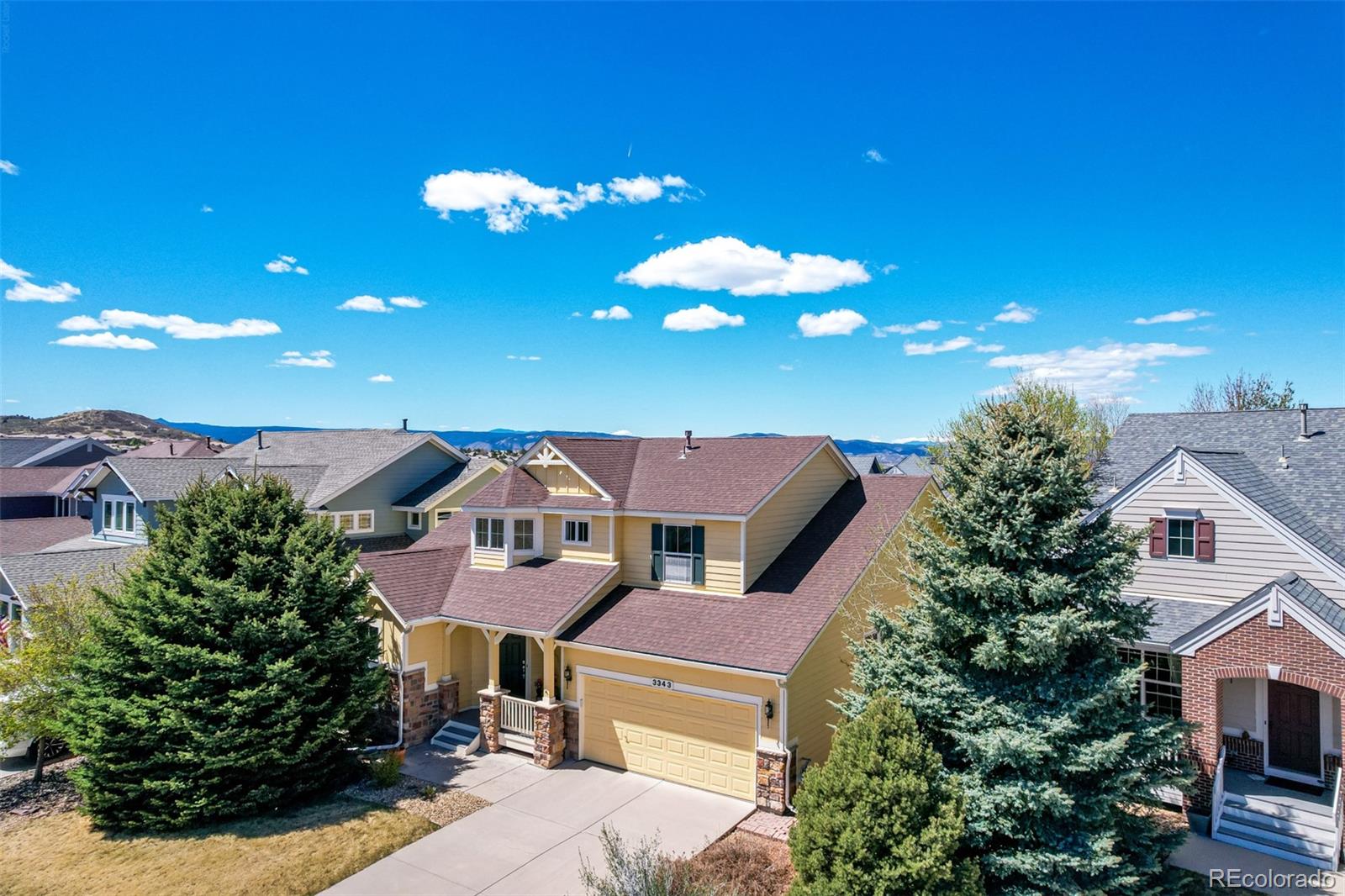 3343 Fantasy Place Castle Rock, CO 80109 - Photo 39 of 50 a view of a house with a yard