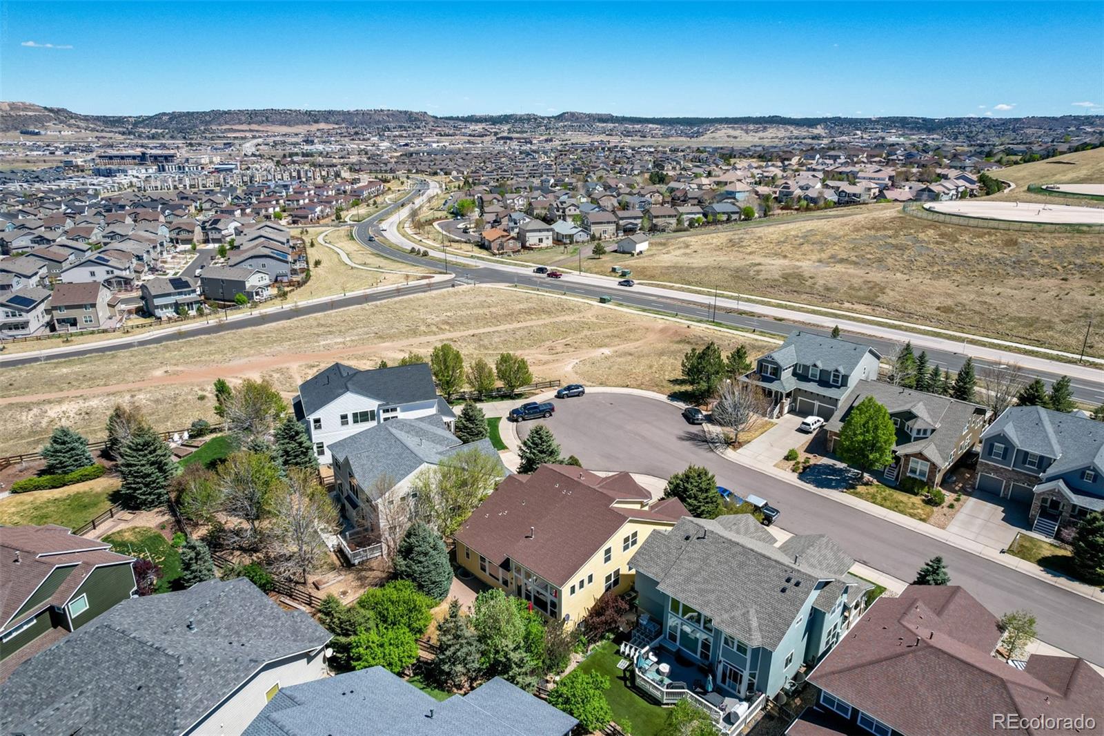 3343 Fantasy Place Castle Rock, CO 80109 - Photo 48 of 50 an aerial view of a house with a lake view