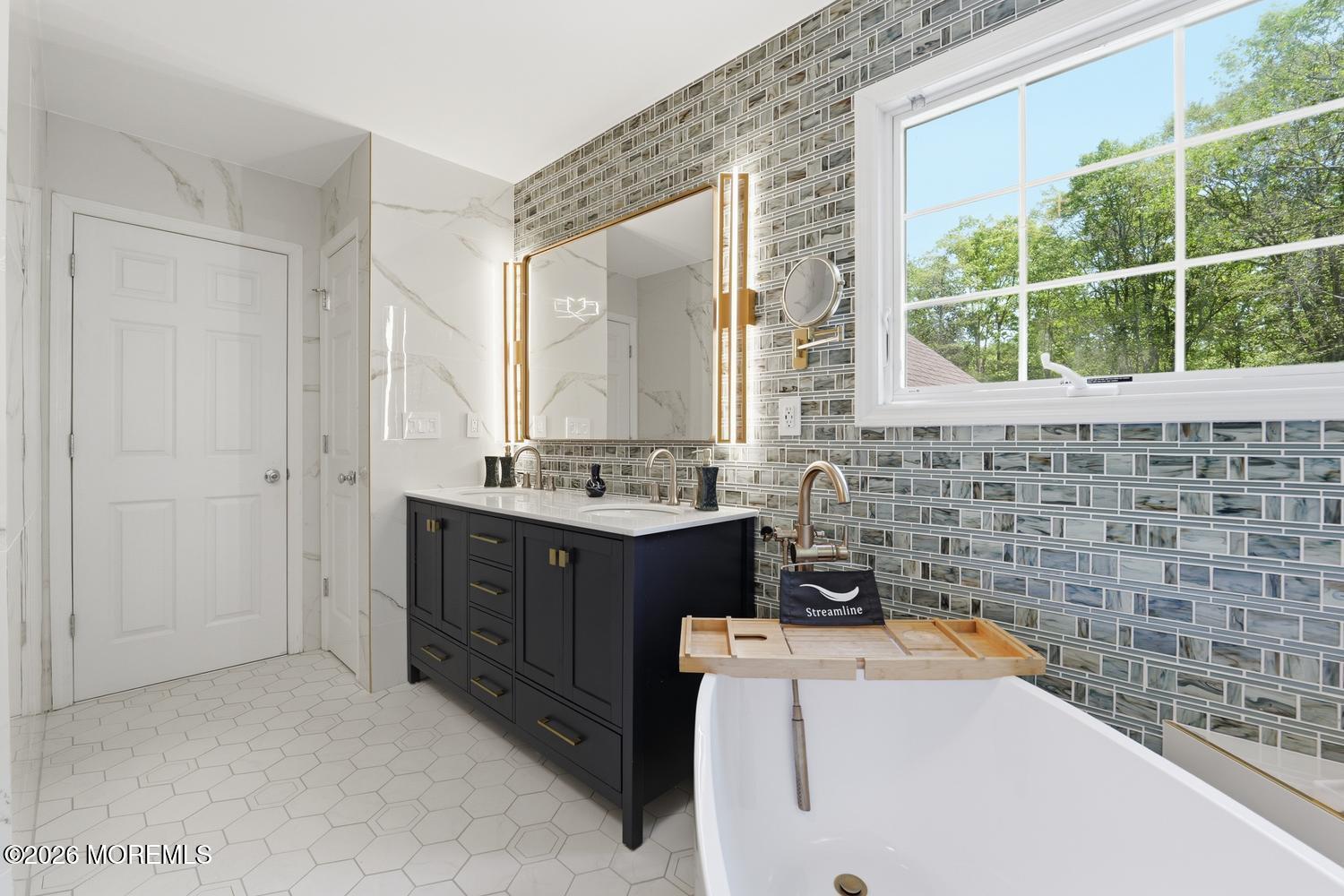7 Cherry Tree Lane Cream Ridge, NJ 08514 - Photo 26 of 47 a bathroom with a sink a vanity and a mirror