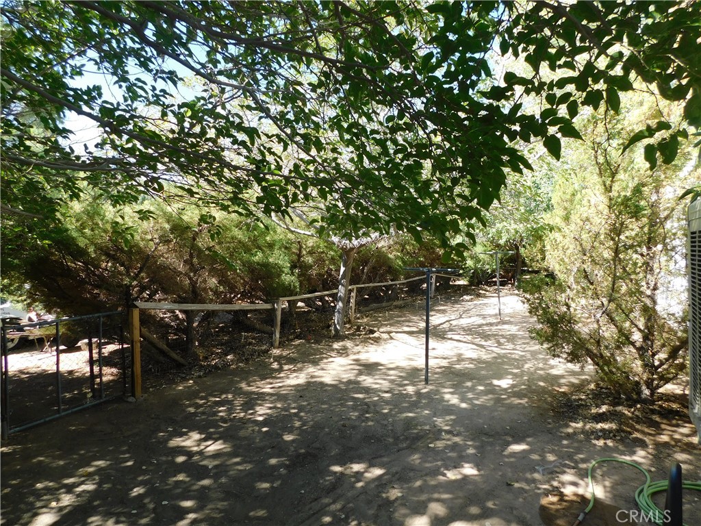 45985 Cottonwood Road Newberry Springs, CA 92365 - Photo 56 of 67 a backyard of a house with lots of green space