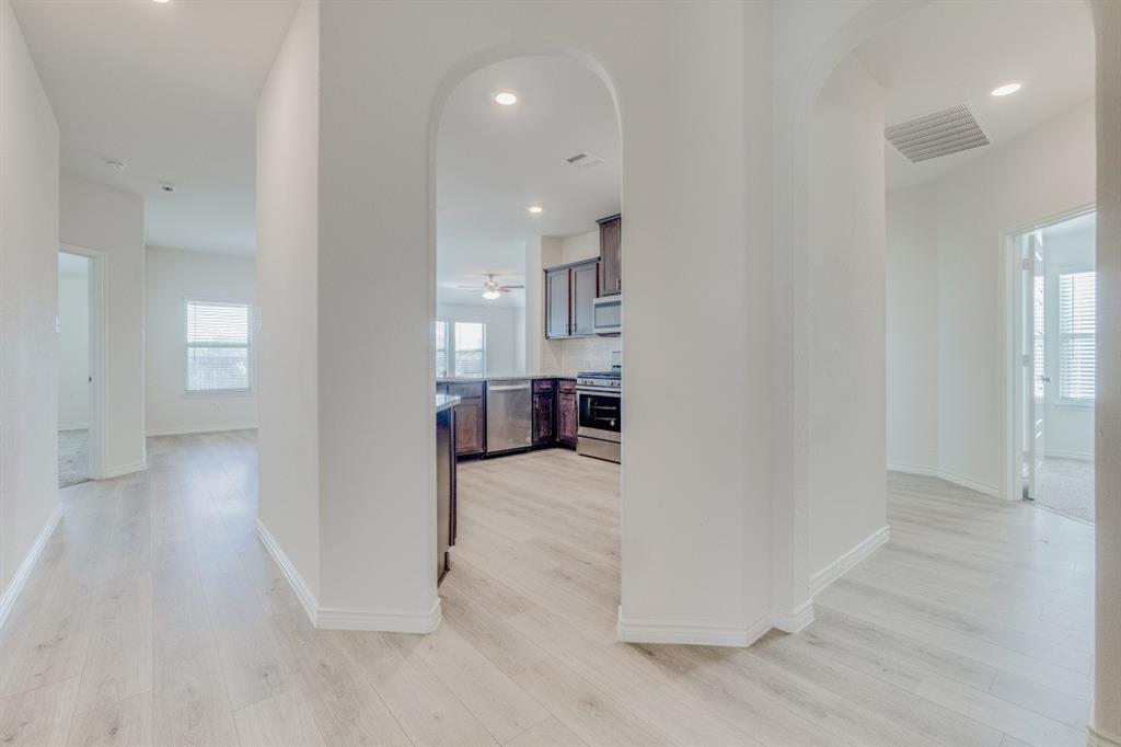 4108 Forest Bend Road Denton, TX 76208 - Photo 7 of 22 looking into the kichen and around