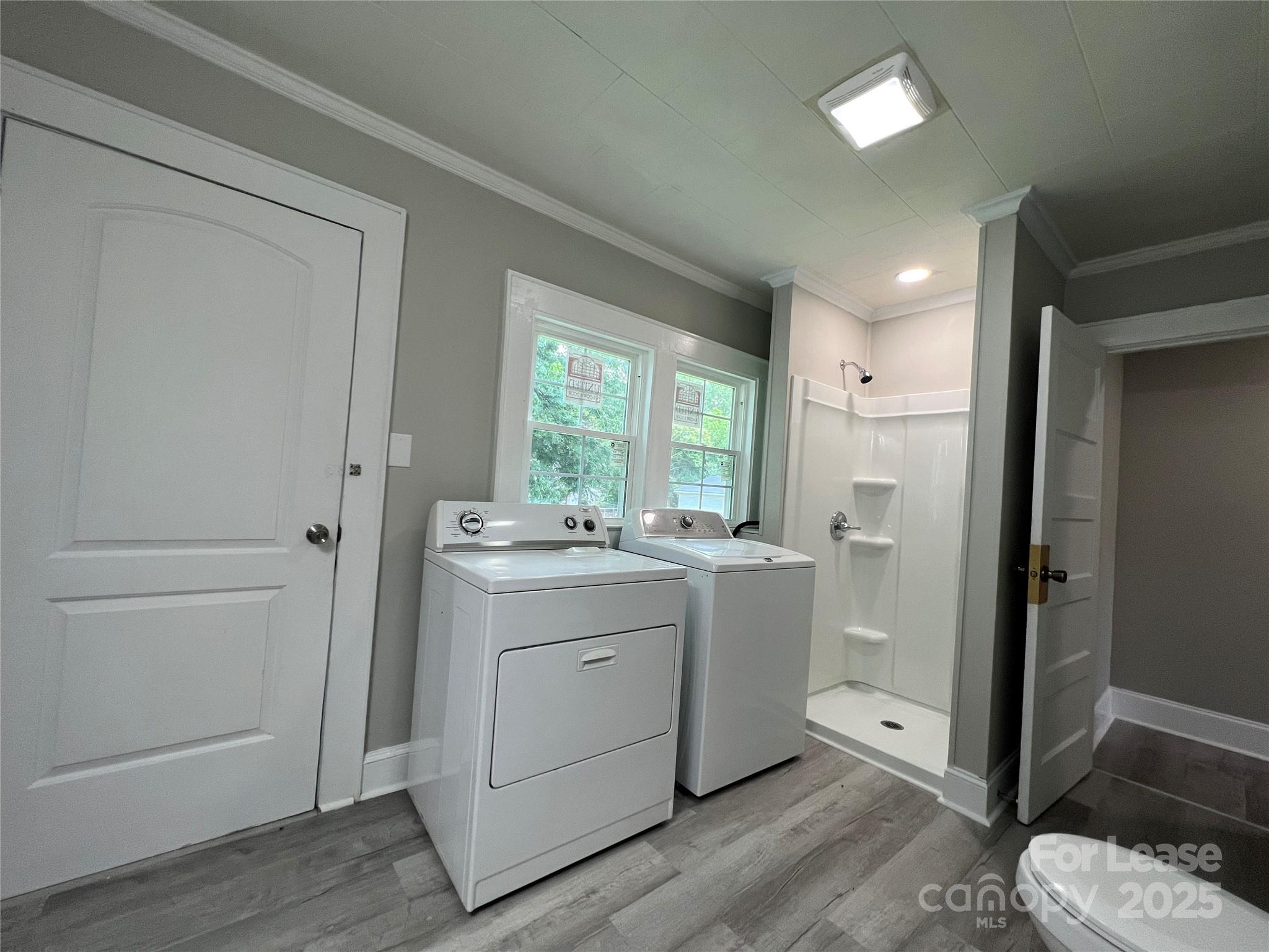 111 East Maryland Avenue Bessemer City, NC 28016 - Photo 9 of 11 a room with a washer and dryer