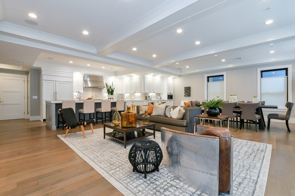 377 West First Street, Unit 2 Boston, MA 02127 - Photo 2 of 39 a living room with lots of furniture and wooden floor