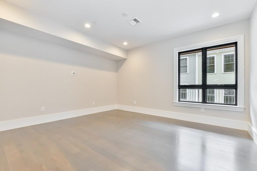 377 West First Street, Unit 2 Boston, MA 02127 - Photo 31 of 39 a view of an empty room with a window