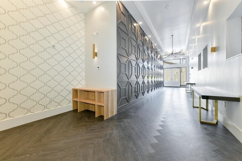 377 West First Street, Unit 2 Boston, MA 02127 - Photo 35 of 39 a view of entryway and hall with wooden floor