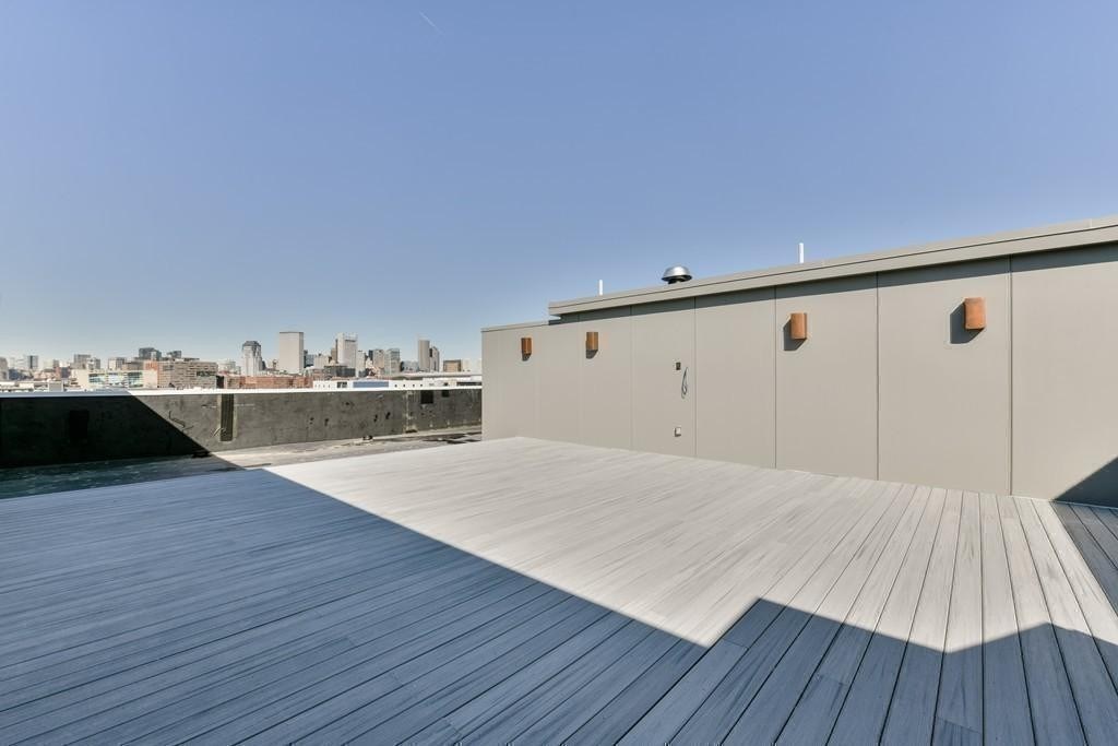 377 West First Street, Unit 2 Boston, MA 02127 - Photo 37 of 39 a view of a kitchen with wooden floor