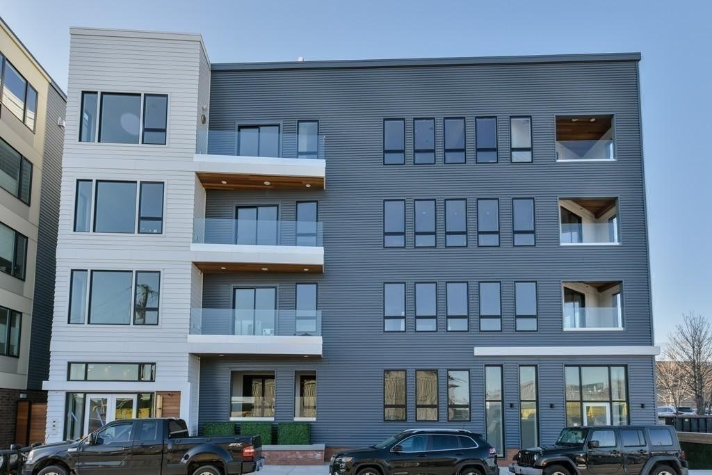 377 West First Street, Unit 2 Boston, MA 02127 - Photo 39 of 39 a front view of residential houses