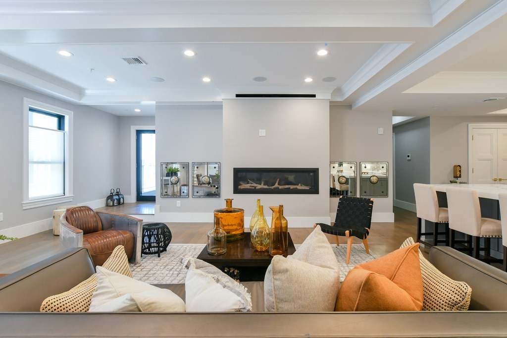 377 West First Street, Unit 2 Boston, MA 02127 - Photo 4 of 39 a living room with furniture and a couch